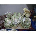 Noritake Mid XX Century Tea Service, of forty pieces in green cream and floral decoration. A Crown