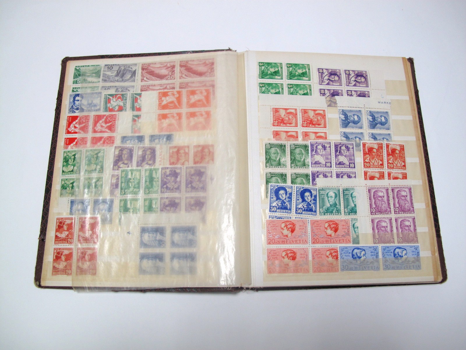 Stamps - Switzerland - Small Stockbook, with a collection of mint Pro Juventute 1918 to 1994. Fairly