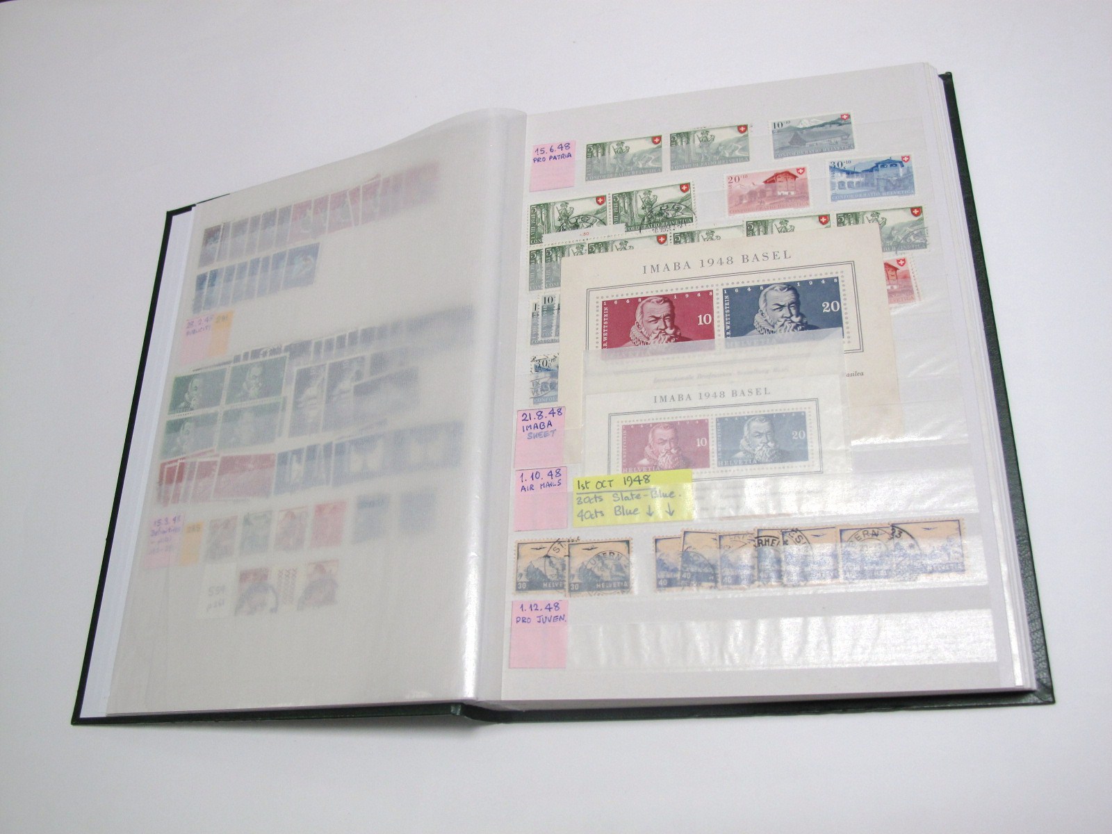 Stamps - Switzerland, four fine 32-page stockbooks with surplus and duplicated stock from 1945-2000.