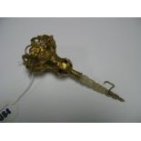 Late XIX/Early XX Century Corsage Posy Holder, in pierced gilt metal with embossed vine and