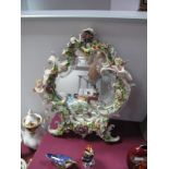 Late XIX Century Dresden Style Porcelain Framed Dressing Mirror, with easel back, ornately decorated