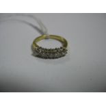 An 18ct Gold Five Stone Diamond Ring, claw set throughout with uniform brilliant cut stones.