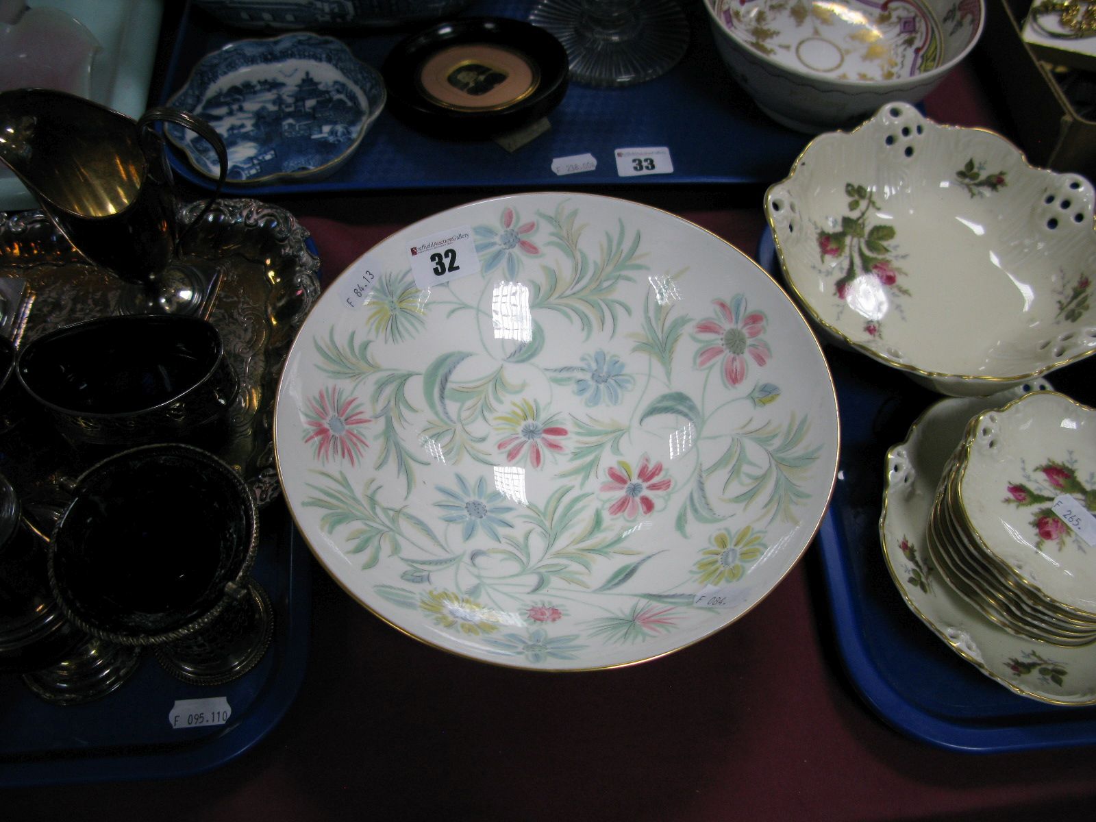 A Minton Circular Footed Bowl, decorated with the "Vanessa" pattern, 22cms diameter.