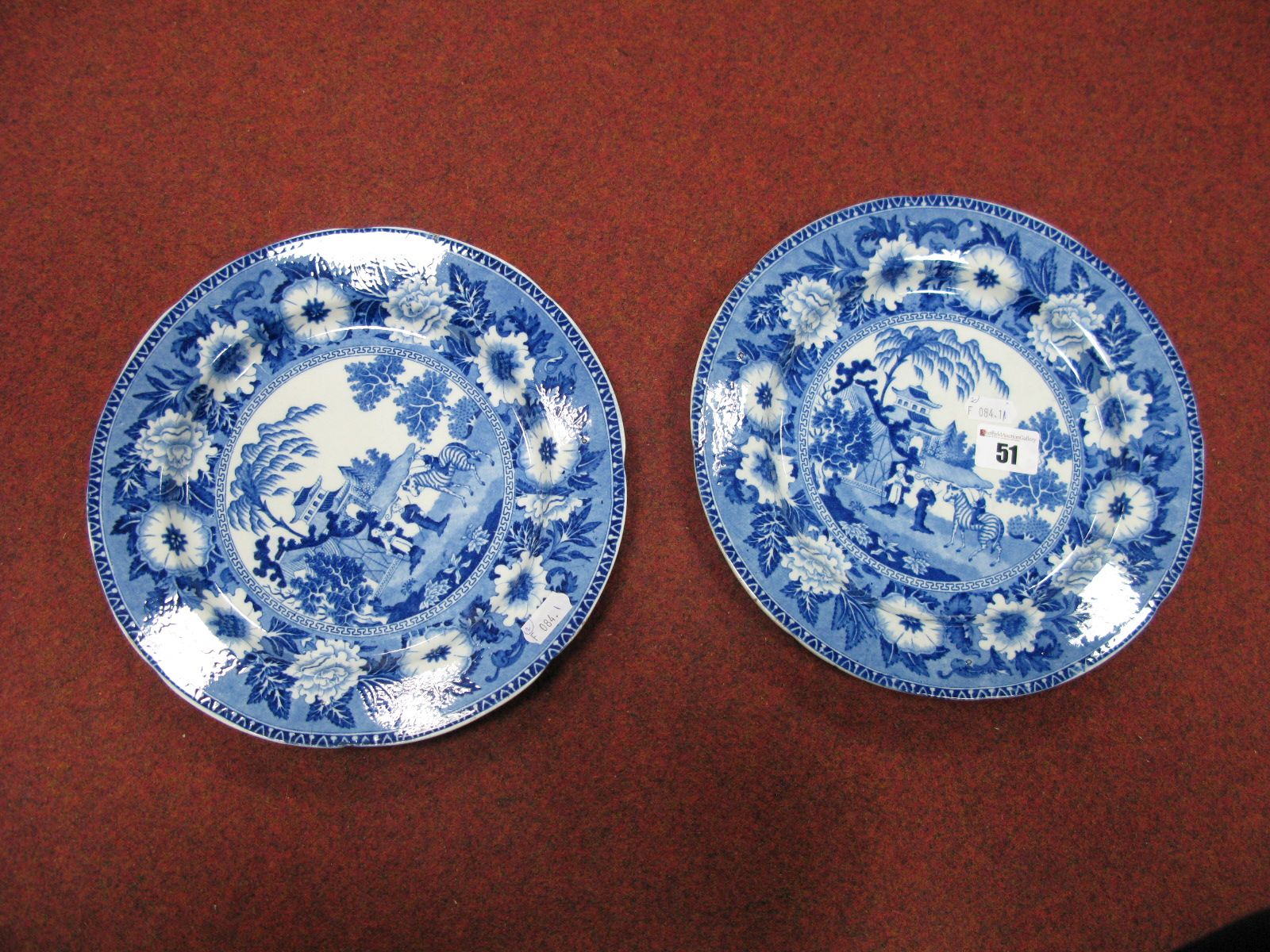 A Pair of XIX Century Blue and White Plates, with impressed mark "Rodgers".