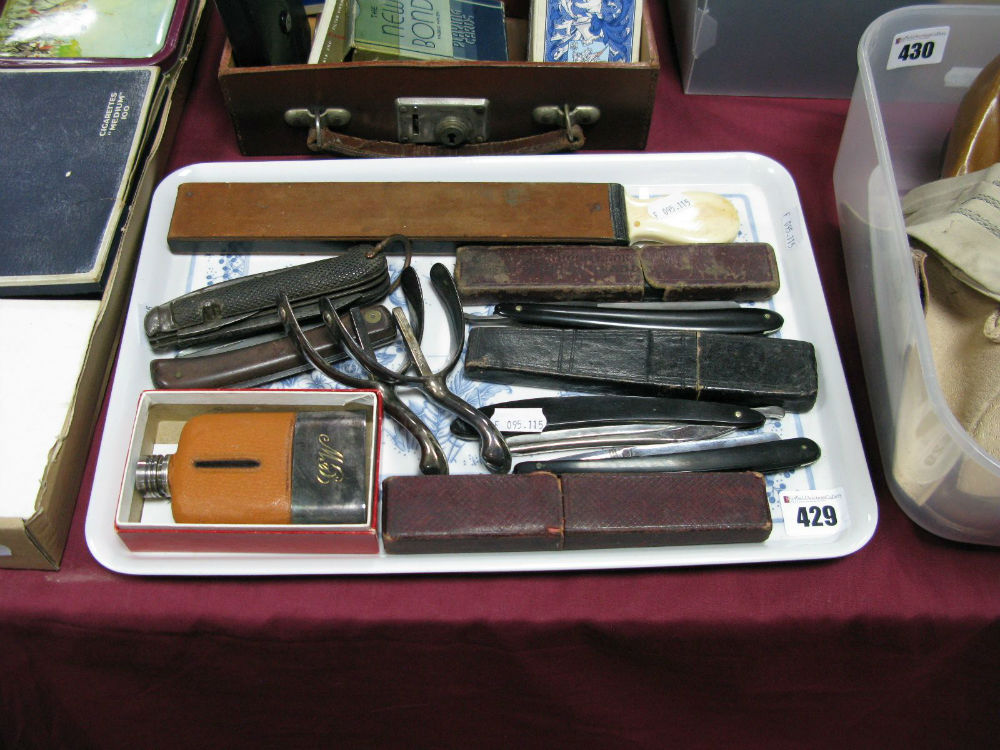 Cutthroat Razors, small hip flask, spurs, single blade folding knife etc:- One tray