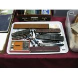 Cutthroat Razors, small hip flask, spurs, single blade folding knife etc:- One tray