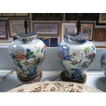 A Pair of Chinese Pottery Table Lamps, circa mid to late XX Century, each profusely decorated with