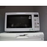 A Panasonic 900W Microwave Oven.