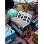 A Vissimio Accordian, blue marbled effect board, 25 keys.