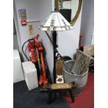A Standard Lamp, with a Tiffany style light shade, together with an African three legged chair.