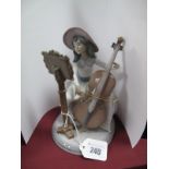 A Lladro Concerto Figurine of a Girl with Cello, numbered 6332.