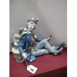 A Lladro Figure Group "Musical Partners", a clown with dog on drum, impressed number 5763.