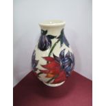 A Moorcroft Pottery Vase, decorated with the "Ruby Red" design by Emma Bossons, shape 7/5, factory