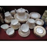 A Royal Worcester Dinner and Tea Service in the "Hyde Park" Pattern, comprising:- six dinner plates,