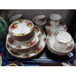 A Quantity of Royal Albert "Old Country Roses" Tea and Dinnerwares, (approximately thirty-eight