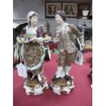 A Pair of XIX Century Continental Porcelain Figures, of Maiden carrying tray of fruit. A matching