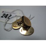 A Pair of 9ct Gold Gent's Cufflinks, each composed of two oval panels, engraved and initialled, on