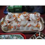 Shelley Tea Ware, circa 1930, having orange and yellow flowers, ring handles to the cups, comprising