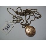 A Muff Chain, applied "9c", suspending circular l,locket chain, stamped "9ct Back & Front".