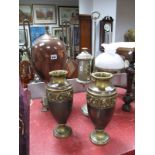 A XIX Century Copper Tea Urn, having brass tap, pair of embossed ovoid vases, oil lamp.