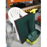 A Set of Four White Plastic Garden Chairs, a lawn seed dispenser and a folding card table. (6)