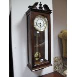 A Fox and Simpson Wall Clock, glazed reproduction mahogany case.