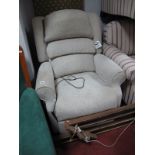 A Sitting Pretty Electric Rise and Recline Armchair, upholstered in beige fabric.