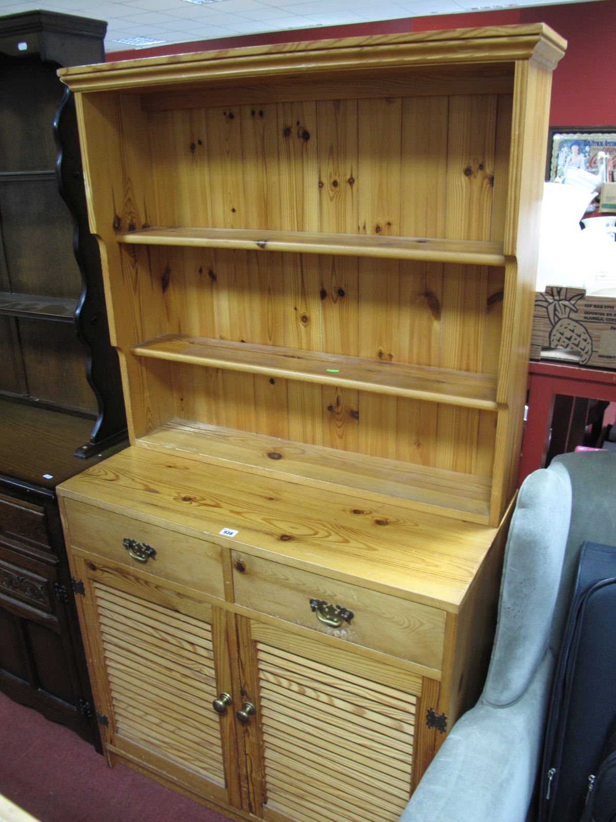 A Modern Pine Kitchen Dresser, three shelves over two frieze drawers and twin slatted cupboard