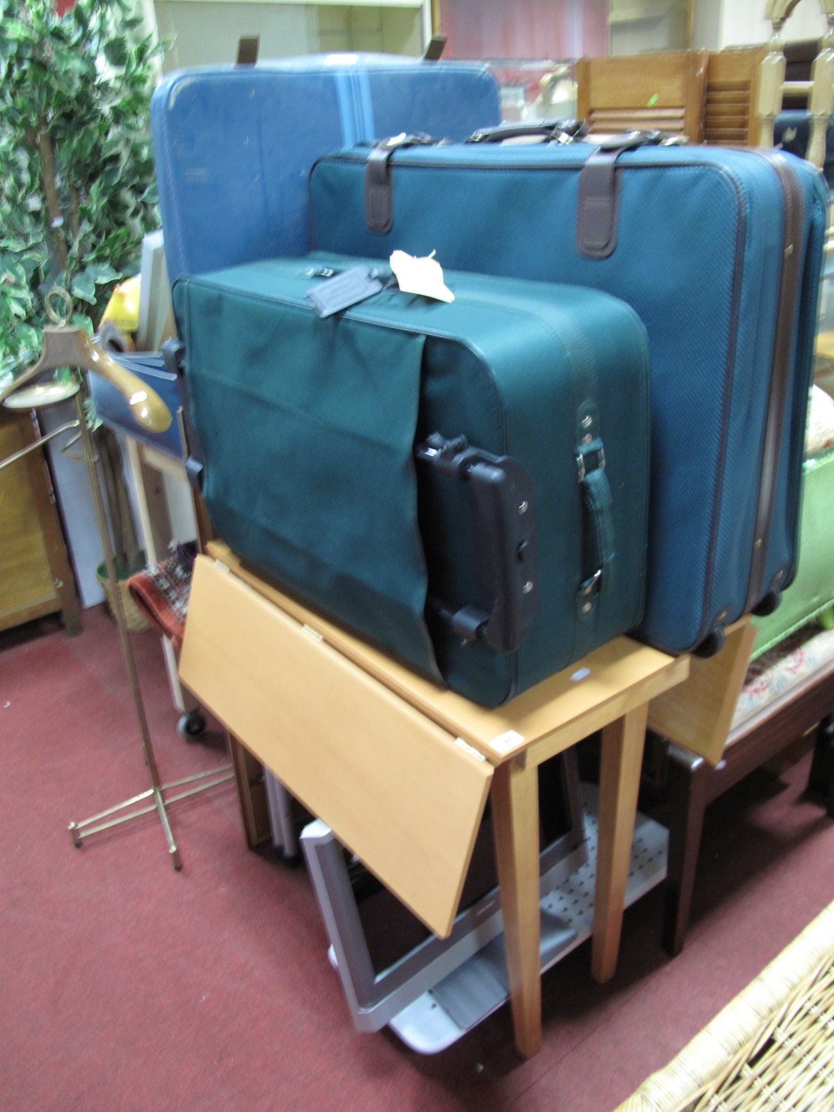 A Drop Leaf Kitchen Table, a Toshiba TV, tray, household steps and two travel cases.