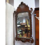 Queen Anne Style Walnut and Gilt Framed Wall Mirror, with steel cresting.