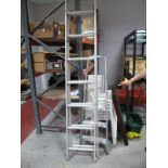 A Set of Sixteen Rung Aluminium Extending Ladders, and a set of household steps.