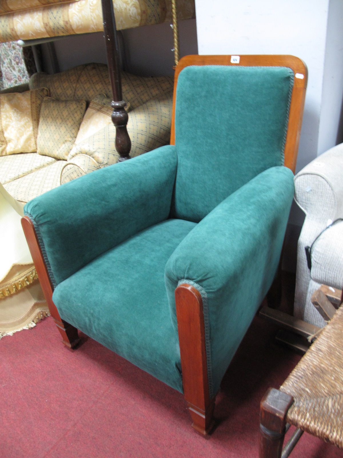 Early XX Century Walnut Framed Armchair, back, arms and seat upholstered in a green draylon, on