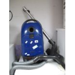 A Miele Electronic S3IZi Air Clean Plus Vacuum Cleaner.