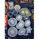 Wedgwood Jasperware, a collection to include jar and cover, trinket pots, cabinet plate, urns, etc:-