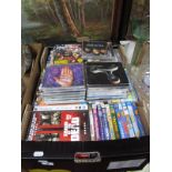 Over 50 DVD's, mostly modern titles including pre and early school themes, CD's, etc. :- One Box