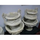 A Pair of Concrete Compana Style Handled Urns, having swag decoration.