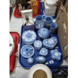 A Collection of Powder Blue Wedgwood Jasperwares, including trinket boxes, jug, chamberstick, vases,