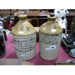 Two Stoneware Flagons, one Fowler and Whittaker, Woodhouse, Sheffield, the other E. Holmes,