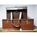 A Vintage Travel Case, with labels and a leather travelling sales mans case.