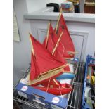 Five Wooden Hulled Star Yachts, red and blue approximately 28cm length. Three need mast re-pinning.