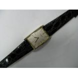 Universal Geneve; A Gent's Wristwatch, the signed rectangular dial with baton markers, within