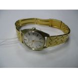 Longines; A Gent's Automatic Wristwatch, the signed dial with baton marker and centre seconds,