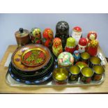 A Quantity of Painted Russian Wooden Graduated Dolls, plates, cups etc:- One Tray