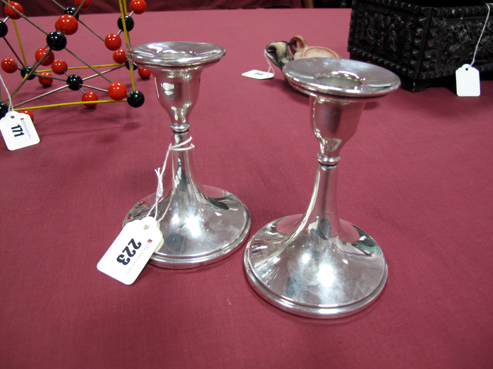 A Pair of Early XX Century Birmingham Hallmarked Silver Candlesticks, of squat tapering form,