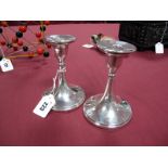 A Pair of Early XX Century Birmingham Hallmarked Silver Candlesticks, of squat tapering form,