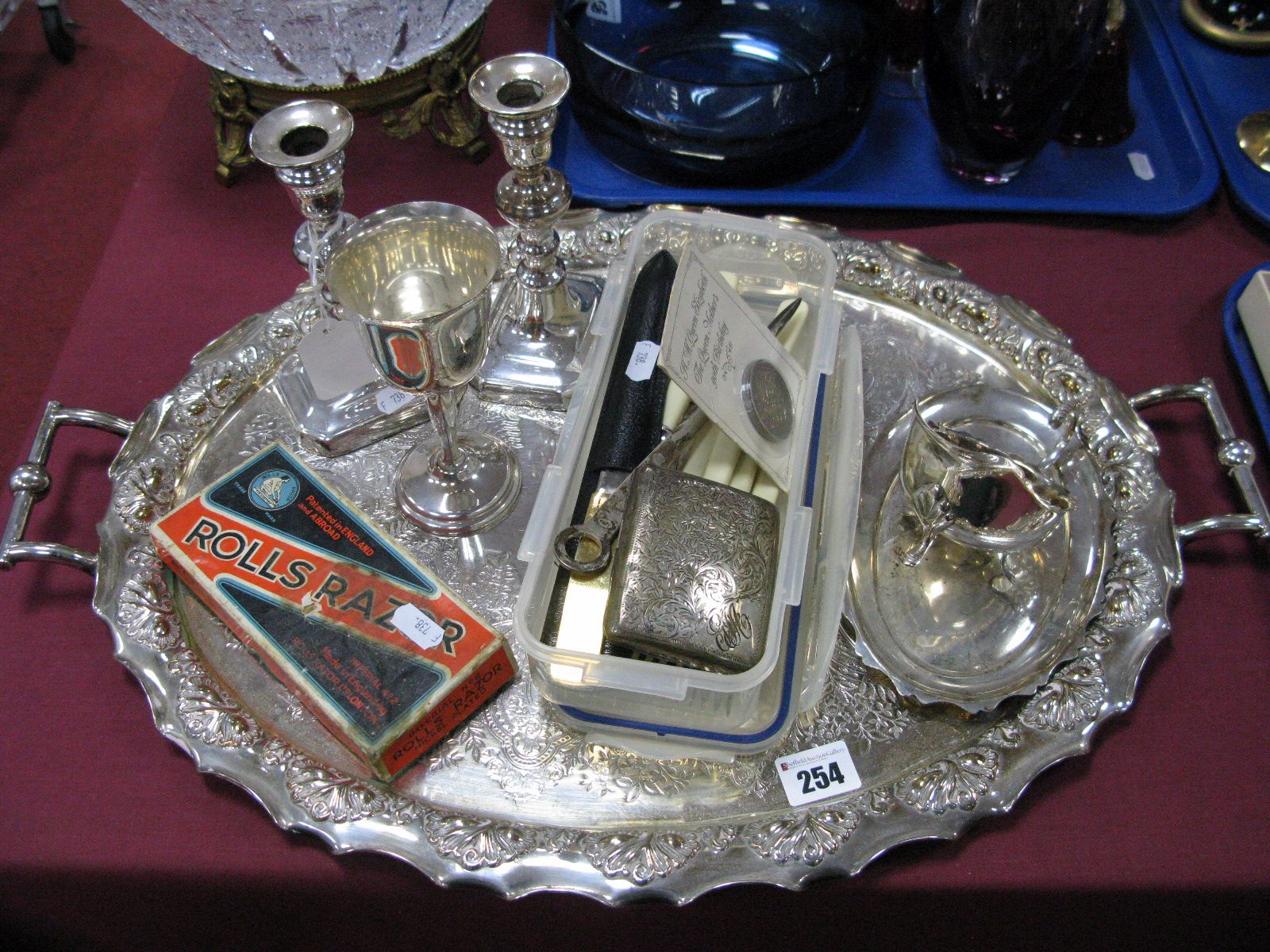 A Hallmarked Silver Cigarette Case, a hallmarked silver meat skewer paper knife, sauce boat on