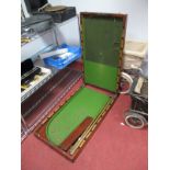 A Victorian Table Top Bagatelle, fold over mahogany case, green baize lined, (with damages), and two