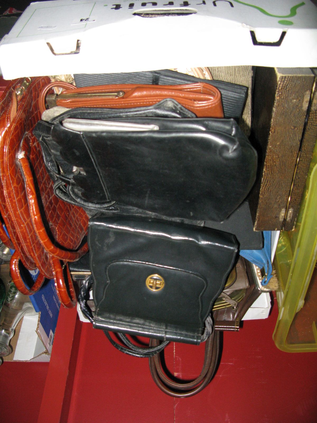 A 1920's Black Leather Handbag, with geometric metal clasp; plus a large collection of later