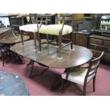 Regency Style Mahogany "D" Ended Dining Table, on twin swept pedestals with spare leaf; together