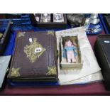 A Victorian Musical Photograph Album, IV Corps newsletter, miniature pot doll, etc:- One Tray